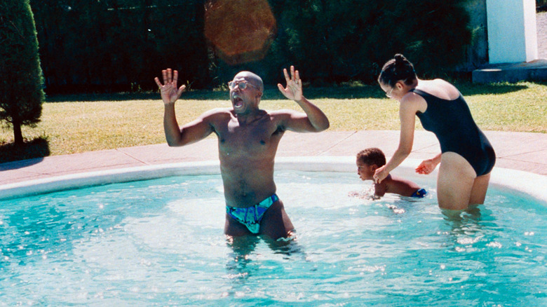 Andre Braugher mugging while in the swimming pool