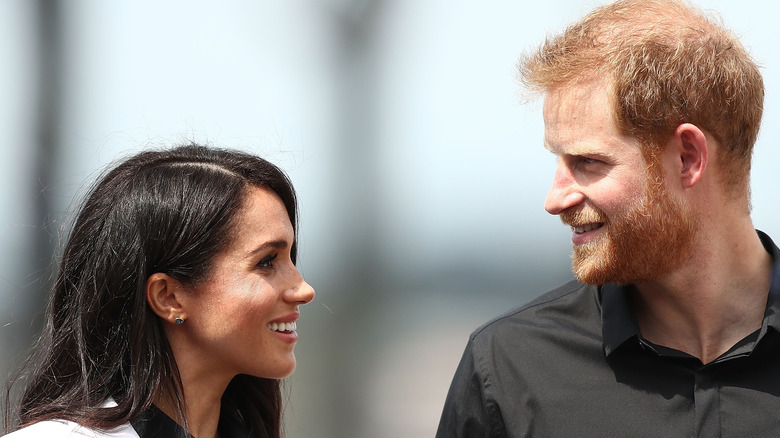 Prince Harry and wife Meghan Markle in public.