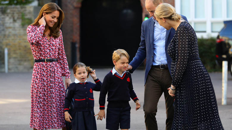 Catherine, Charlotte, George, and William at school