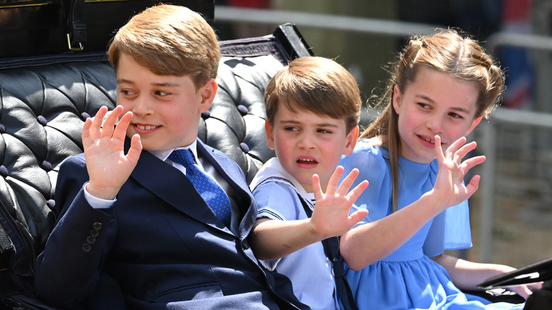 George, Louis, and Charlotte waving 