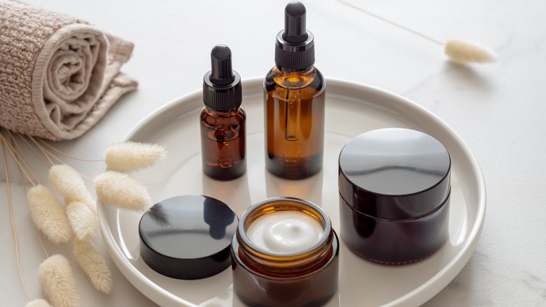 Serums and creams on a tray