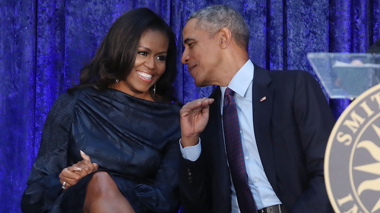 Barack Obama and Michelle Obama talking