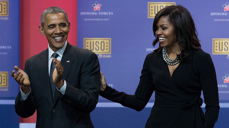 Barack and Michelle Obama laughing