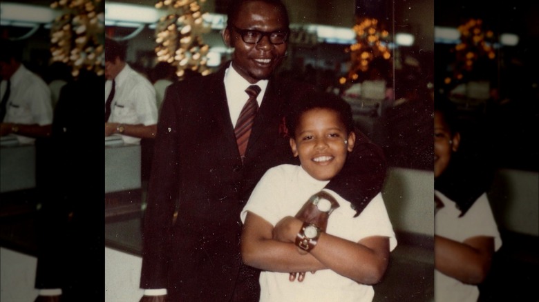 Barack Obama Sr. puts arm around young Barack Obama