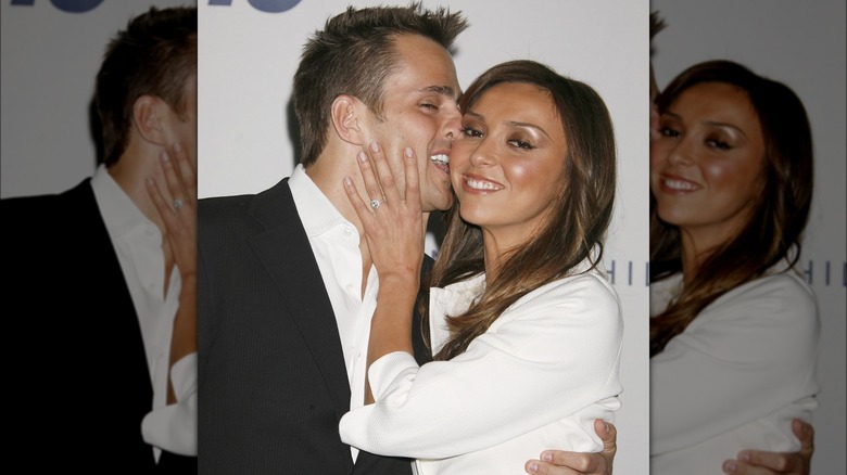 Bill Rancic kissing his wife's cheek