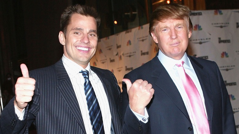 Bill Rancic and Donald Trump flashing thumbs up