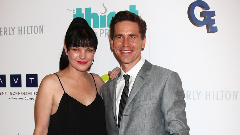 Brian Dietzen & Pauley Perrette posing together