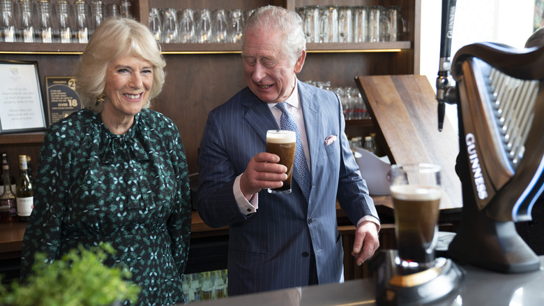 Camilla Parker Bowles and Prince Charles smiling 