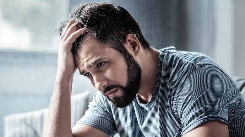 Man hand in hair