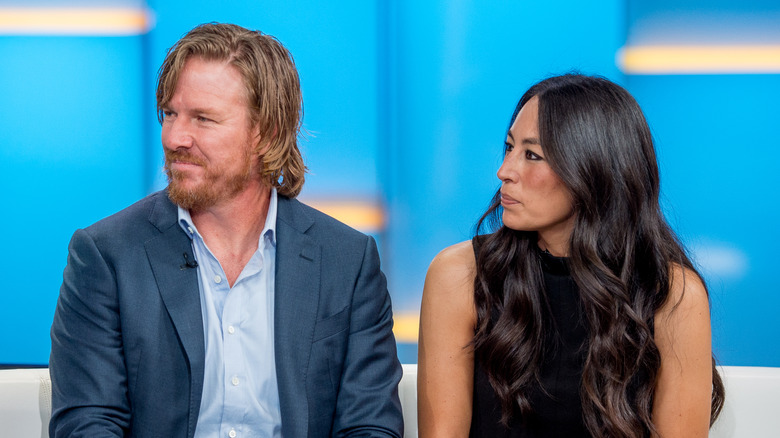 Chip and Joanna Gaines listening during an interview