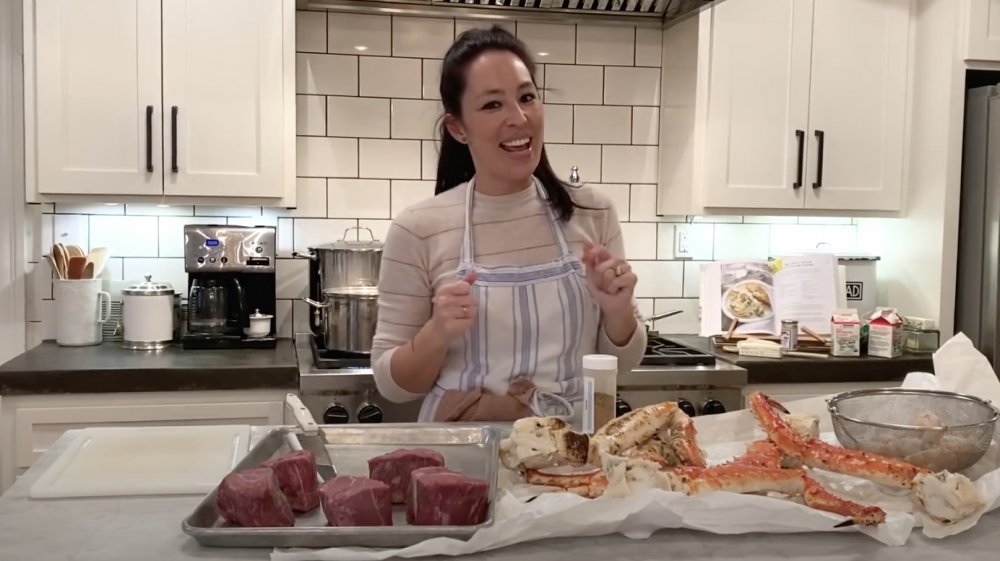 Joanna Gaines from Fixer Upper preparing food in a kitchen