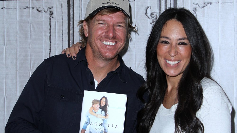 Chip Gaines and Joanna Gaines from Fixer Upper with their book