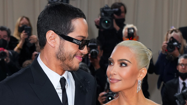 Kim Kardashian and Pete Davidson on the red carpet. 