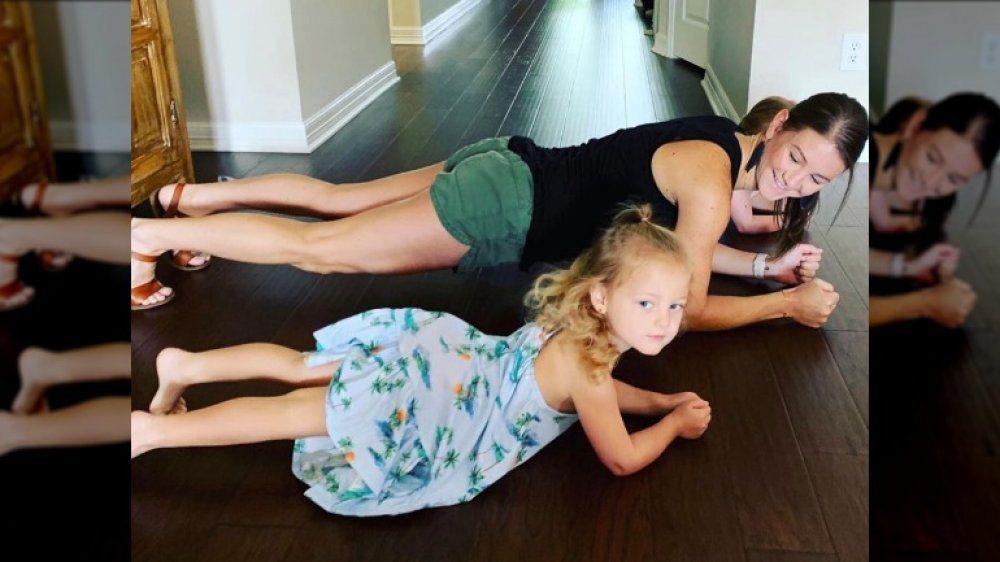 Danielle Busby doing planks at home