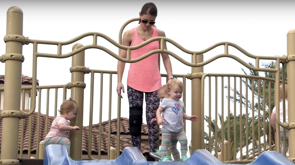 Danielle Busby outside with her kids