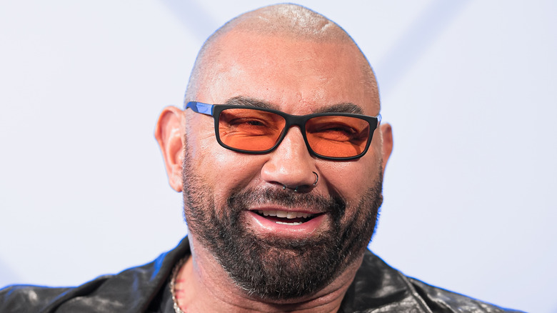 Dave Bautista speaks onstage at an event