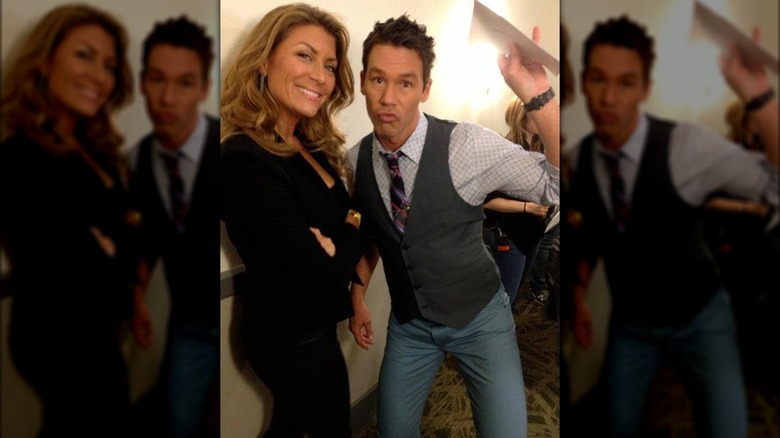 Genevieve Gorder smiling next to a silly David Bromstad