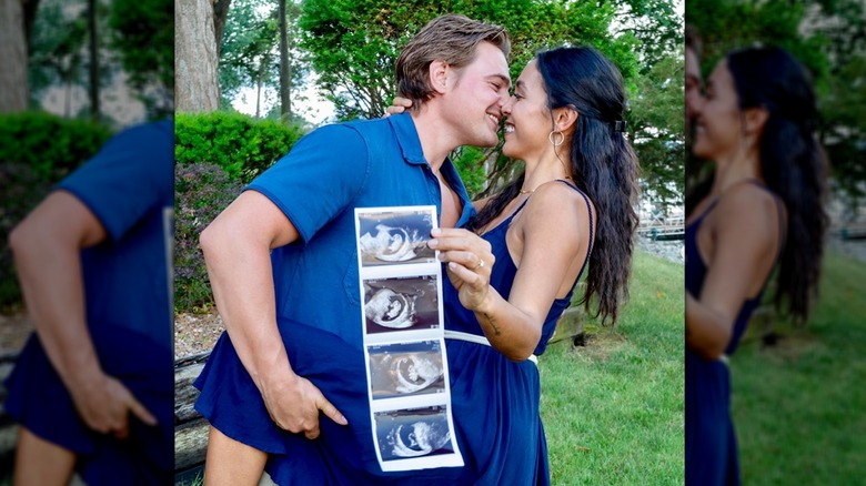 Julana and Carson Boatman holding their sonogram