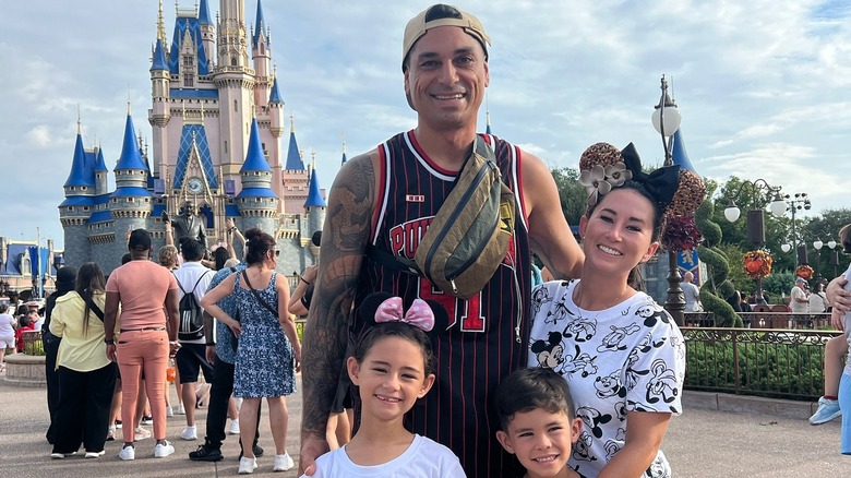 Kamohai and Tristyn with kids at Disney World