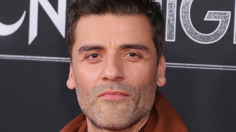 Oscar Isaac posing for photo