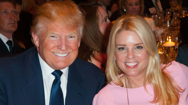 Donald Trump sitting next to Pam Bondi