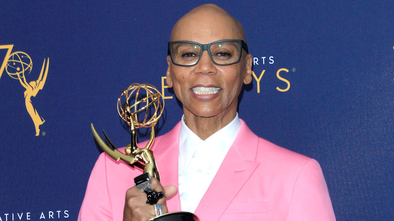 RuPaul Charles poses with his Emmy award