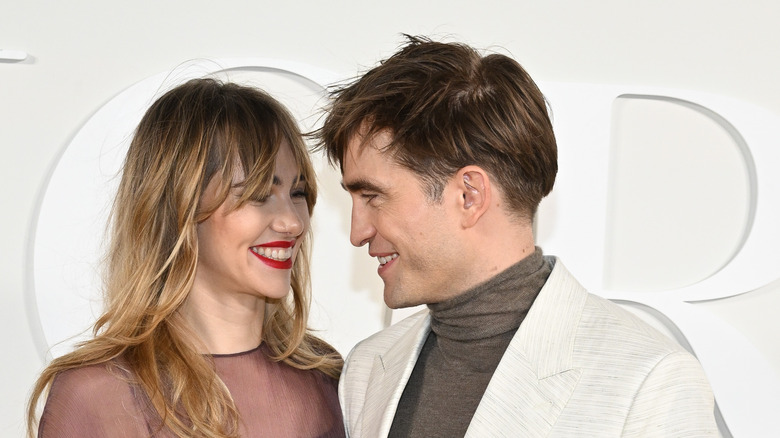 Robert Pattinson and Suki Waterhouse smiling