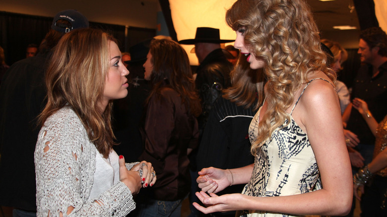 Miley Cyrus and Taylor Swift talking