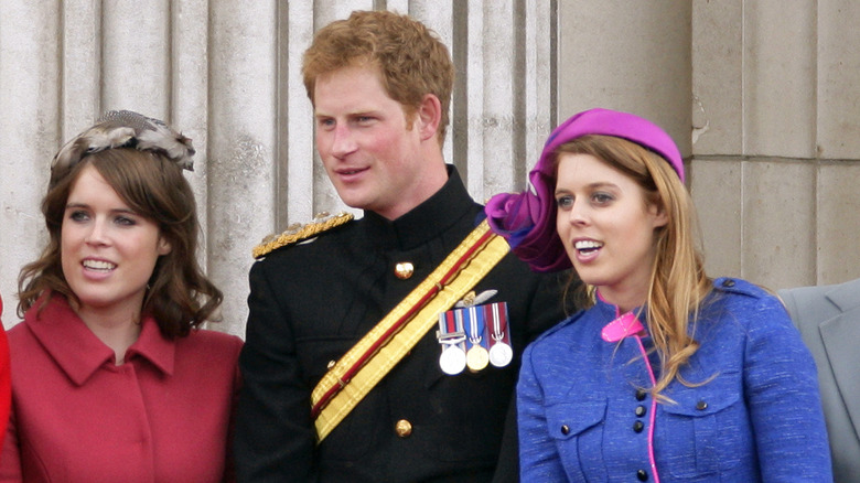 Princess Beatrice, Princess Eugenie, and Prince Harry at a royal event