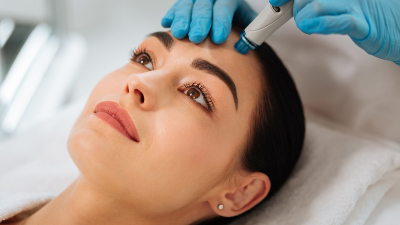 Woman receiving HydraFacial treatment