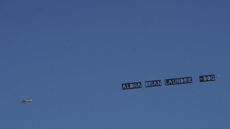 Banner that reads "aloha Brian Laundrie-Dog" flying in Florida 