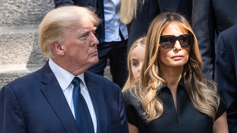 Donald Trump and melania scowling