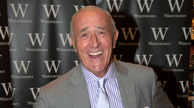 Len Goodman smiling with his mouth open