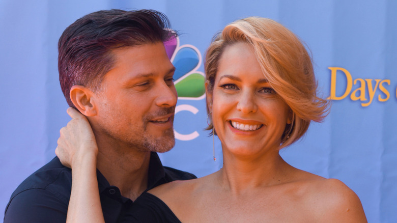 Greg Vaughan and Arianne Zucker posing