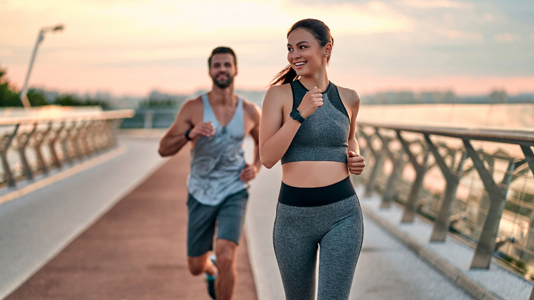 Woman and man running for exercise