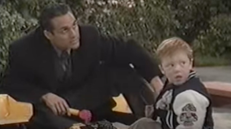 Sonny with Michael playing in the sand