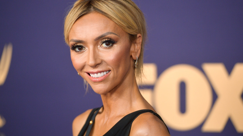 Giuliana Rancic smiling at event