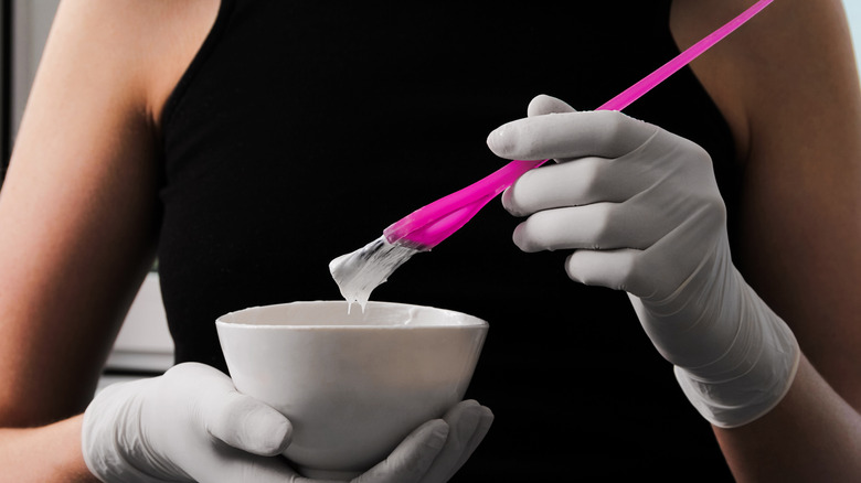 Woman mixing hair dye