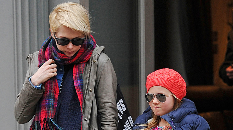 Michelle Williams and young Matilda Ledger walking