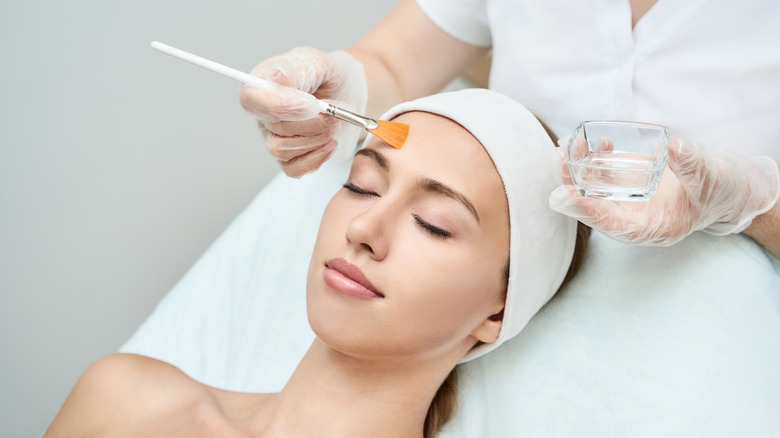 Woman having a chemical peel