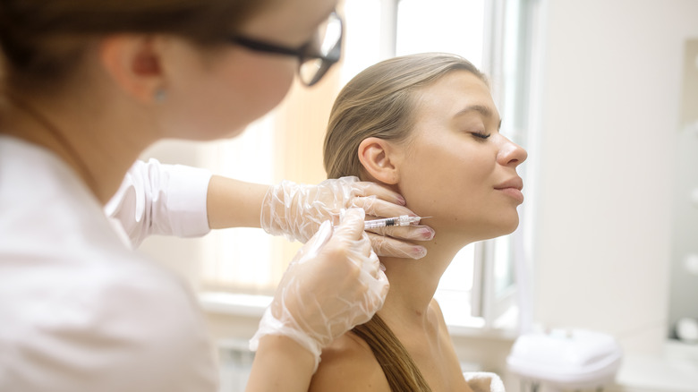 woman getting jaw filler