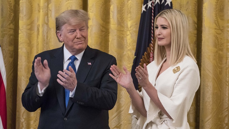 Ivanka Trump and Donald Trump clapping hands