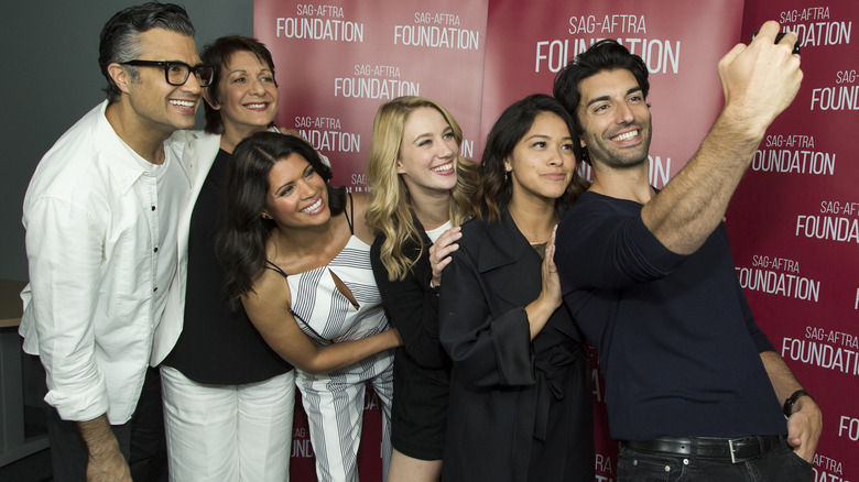 The cast of Jane the Virgin smiling