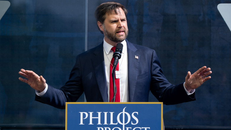 JD Vance speaking onstage at an event