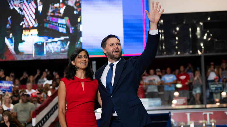 Usha Vance smiling while JD Vance waves