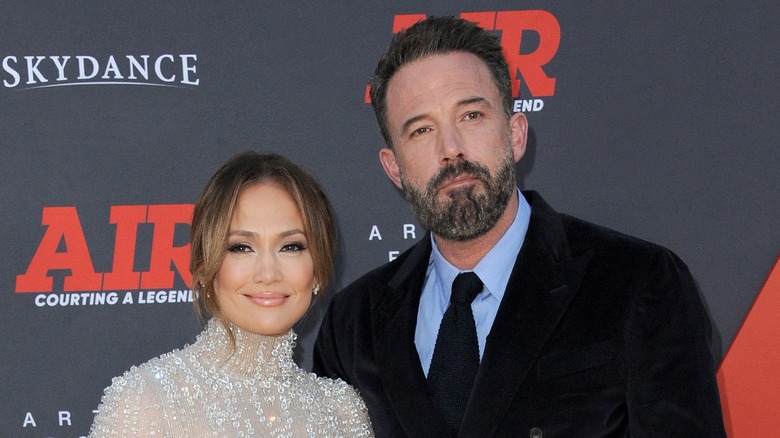 Jennifer Lopez posing with Ben Affleck