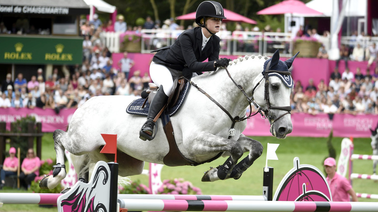 Jennifer Gates riding a horse 