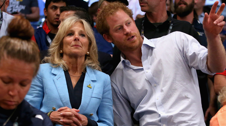 Prince Harry talking to Jill Biden during event