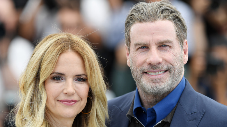 John Travolta and wife Kelly Preston smiling