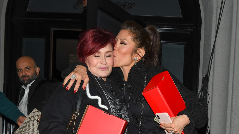 Julie Chen hugging Sharon Osbourne 